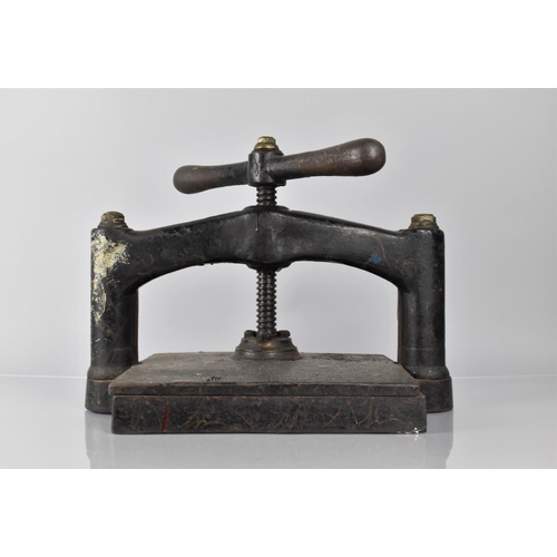 75 - A Late Victorian Cast Iron Book Press, 40cm Wide and 32cm High