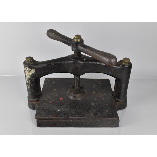 75 - A Late Victorian Cast Iron Book Press, 40cm Wide and 32cm High