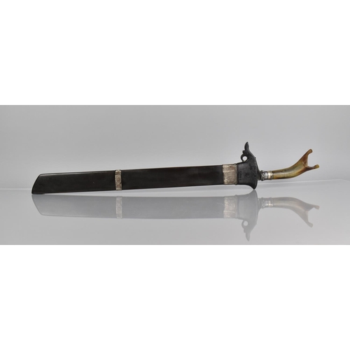 149 - An Indonesian Short Sword or Perang with Horn Handle and Wooden Scabbard