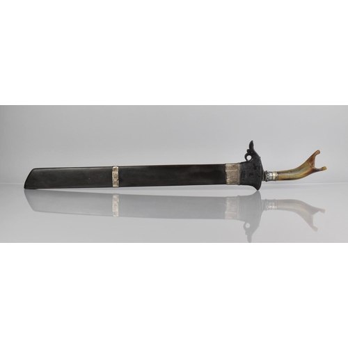 149 - An Indonesian Short Sword or Perang with Horn Handle and Wooden Scabbard