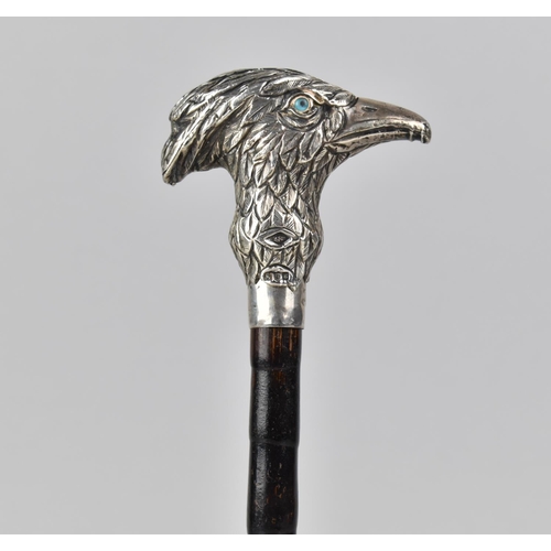 188 - An Edwardian Silver and Bamboo Parasol Handle with Silver Gryffin Head Finial, London 1902, Hallmark... 