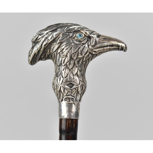 188 - An Edwardian Silver and Bamboo Parasol Handle with Silver Gryffin Head Finial, London 1902, Hallmark... 