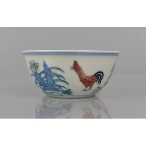 339 - A Chinese Porcelain Doucai Chicken Cup in the Ming Style (1368-1644), Six Character Mark to Base for... 