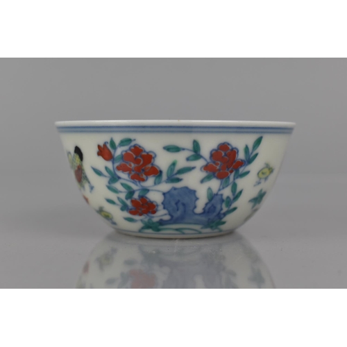 339 - A Chinese Porcelain Doucai Chicken Cup in the Ming Style (1368-1644), Six Character Mark to Base for... 