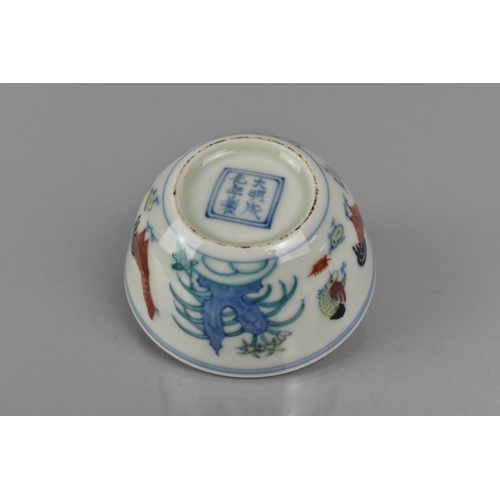 339 - A Chinese Porcelain Doucai Chicken Cup in the Ming Style (1368-1644), Six Character Mark to Base for... 