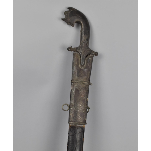 147 - A 19th Century Arab Nimcha Type Sword having Single Edge Curved Steel Blade, Silver Covered Pistol G... 