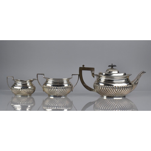 186 - A George V Silver Three Piece Tea Service by William Aitken, Birmingham Hallmark 1930, Decorated wit... 