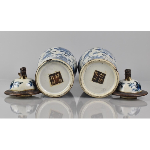 346 - A Pair of Chinese Blue and white Crackle Glazed Baluster Vases and Covers Decorated in Flower. Butte... 