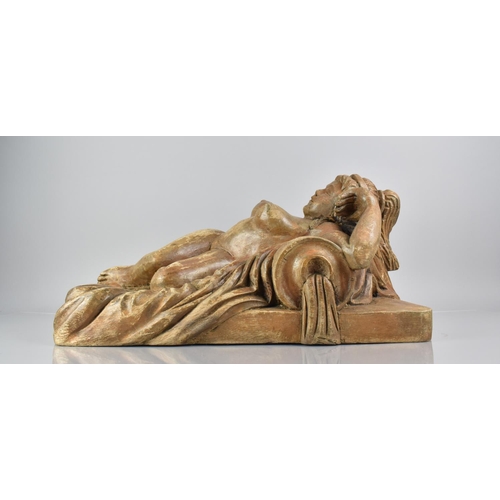 391 - An Early 20th Century Indonesian Carved Wooden Figure of a Female Nude Reclining on a Upholstered Be... 