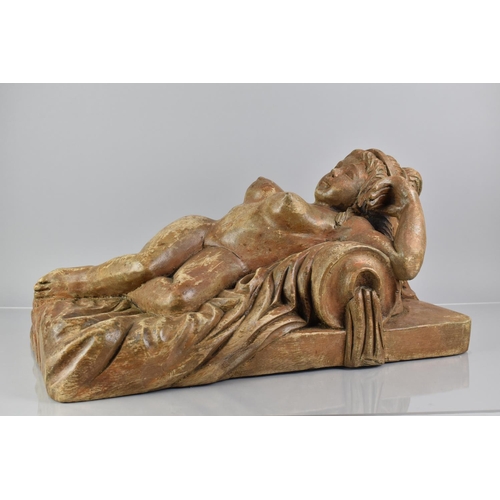 391 - An Early 20th Century Indonesian Carved Wooden Figure of a Female Nude Reclining on a Upholstered Be... 