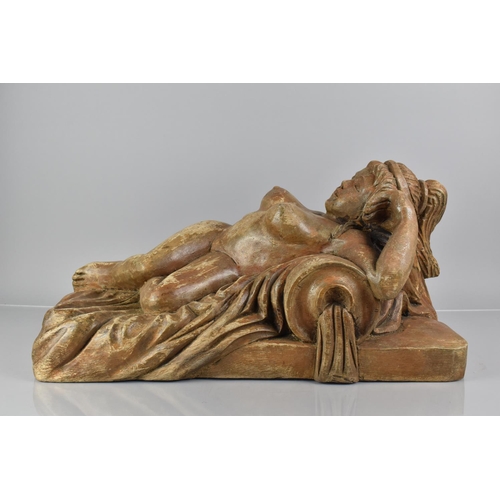 391 - An Early 20th Century Indonesian Carved Wooden Figure of a Female Nude Reclining on a Upholstered Be... 