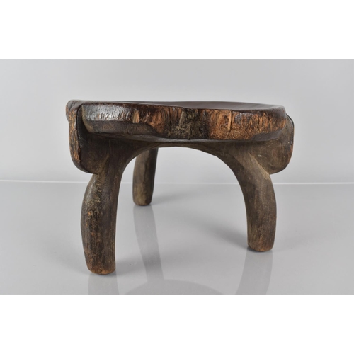 393 - A Late 19th Century African Carved Wood He-He Stool from Tanzania, with a Well Patinated Dished Top ... 