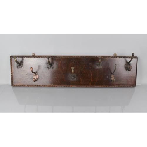 57 - A Late 19th Century Country House Wall Mounted Coat Rack, The Hooks Mounted on a Carved Oak Panel, 2... 