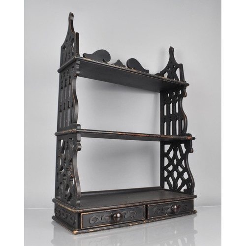 125 - A Set of Ebonised Mahogany Three Tier Wall Shelves with Two Drawers and Decorative Pierced Ends, 19x... 