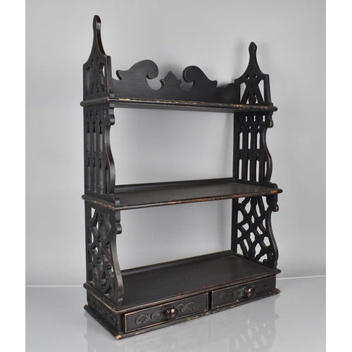 125 - A Set of Ebonised Mahogany Three Tier Wall Shelves with Two Drawers and Decorative Pierced Ends, 19x... 