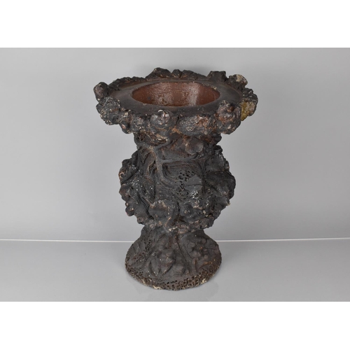 414 - A 19th Century Glazed Terracotta Faux Bois Garden Urn, 43cms High