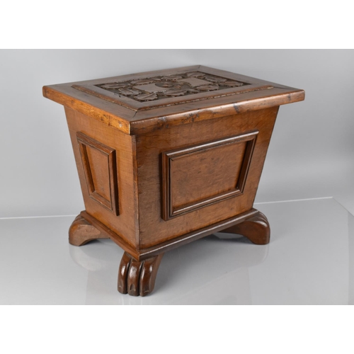 7 - An Early 20th Century Arts and Crafts Style Oak Box of Sarcophagus Shape, Top with Carved Oak Leaves... 