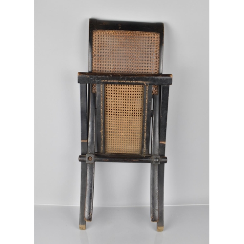 413 - A 19th Century Ebonised Wooden Folding Chair and Back, 60cms High