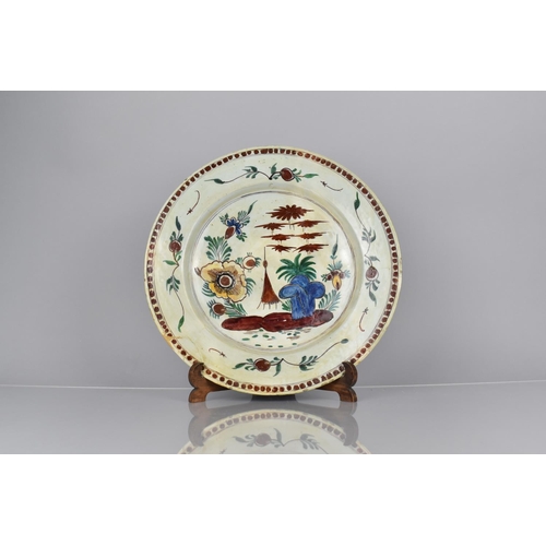 408 - An 18th Century Dutch Delft Charger with Polychrome Decoration, Some Historic Repairs, 35cms Diamete... 