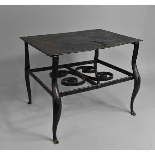 330 - A Cast Iron Footman, Wrought Iron Central Stretcher