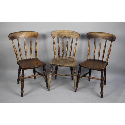 484 - A Set of Three Elm Seated Spindle Back Kitchen Chairs