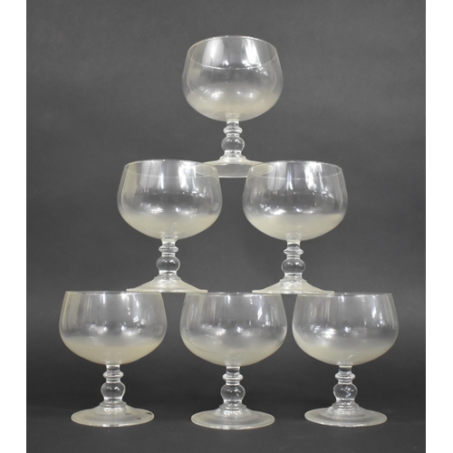 328 - A Set of Six Glass Goblets having Knopped Stems on Circular Feet