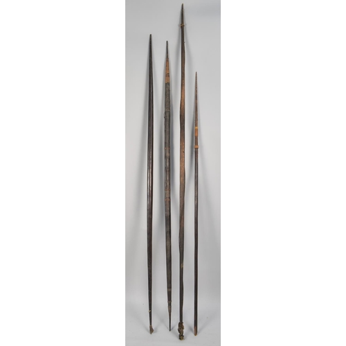 389 - Three Early African Nomadic Tribal Bows and a Throwing Spear