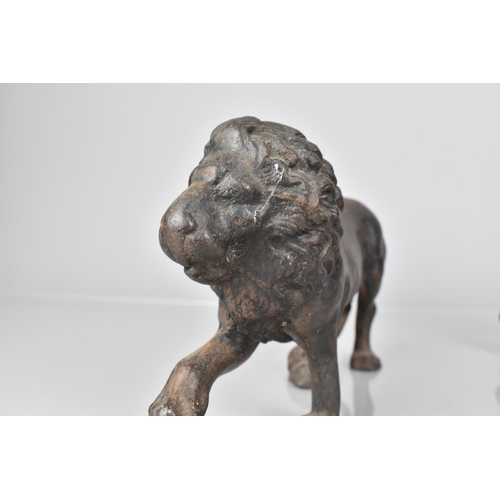 76 - A Pair of Regency Cast Iron Door Porters in the Form of Medici Lion, Missing Plinth Bases and with O... 