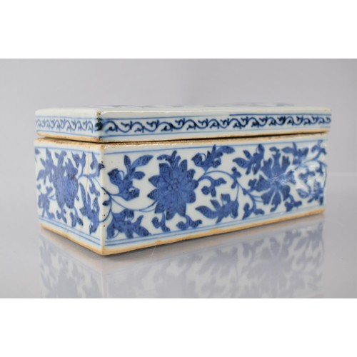 369 - A Chinese Porcelain Blue and White Pen Box and Cover of Rectangular Form, 18.5x9.5x7.5cms High