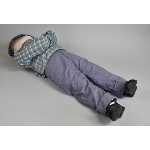 110 - A Novelty Full Size Doll in the form of Young Child, 60cms High, Face af