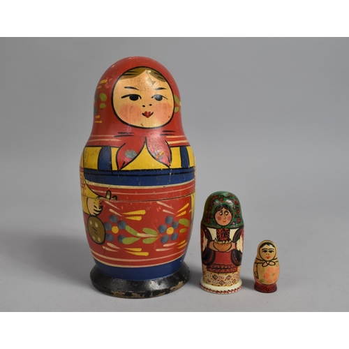 131 - A Collection of Souvenir Russian Dolls, Tallest 19cms High