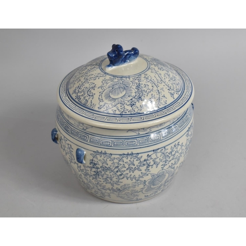 257 - A Chinese Blue and White Kamcheng Pot and Cover with Temple Lion Finial, 21cm high