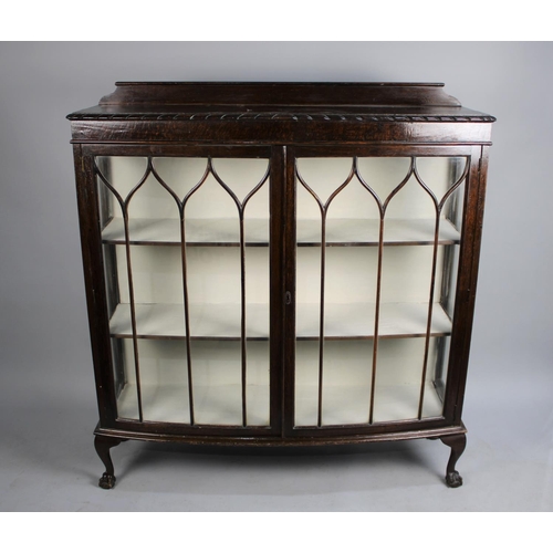 465 - A Mid 20th Century Bow Fronted Oak Galleried Two Shelf Display Cabinet, 122cms Wide, Claw and Ball F... 