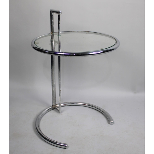 476 - A Modern Circular Chrome and Glass Rise and Fall Table, 51cms Diameter