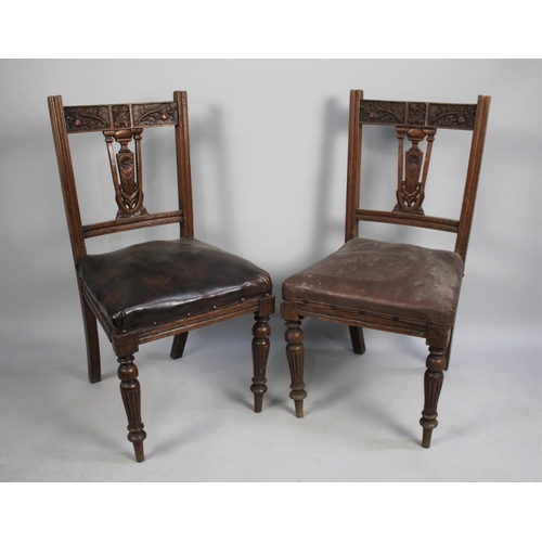 482 - A Pair of Edwardian Carved Oak Frame Side Chairs with Hide Seats