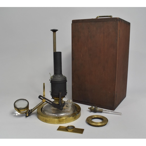 A Late Victorian Microscope Lamp by R and J Beck, London with Lacquered Brass Ring Base, Signed, Burner Assembly with Chimney and Glass Reservoir, Adjustable Bull's Eye Lense with Original Mahogany Case, 30cms High