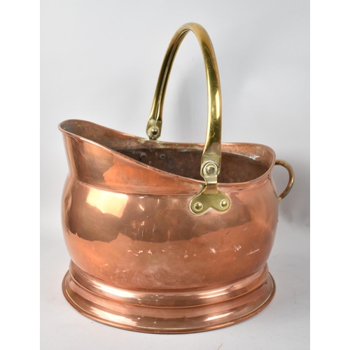 64 - A Modern Copper and Brass Helmet Shaped Coal Scuttle