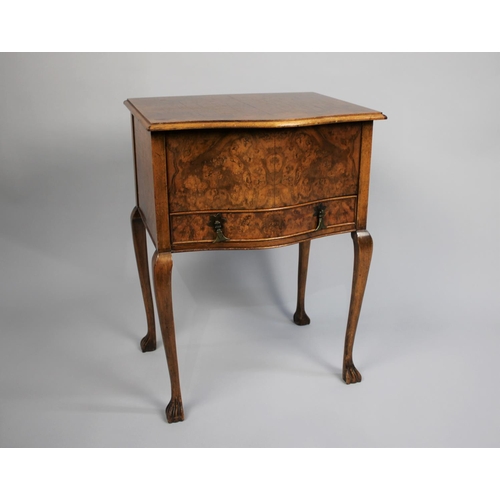 86 - A Mid 20th Century Burr Walnut Lift Top Sewing Box on Cabriole Supports with Carved Claw Feet, Base ... 