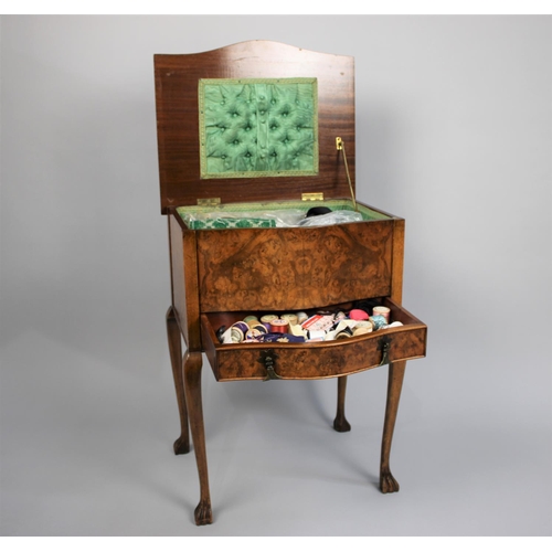 86 - A Mid 20th Century Burr Walnut Lift Top Sewing Box on Cabriole Supports with Carved Claw Feet, Base ... 