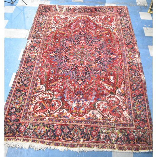 456 - A Large Antique Persian Heriz Rug on Red Ground, Some Wear and Condition Issues, 340x240cms