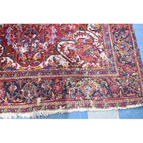 456 - A Large Antique Persian Heriz Rug on Red Ground, Some Wear and Condition Issues, 340x240cms