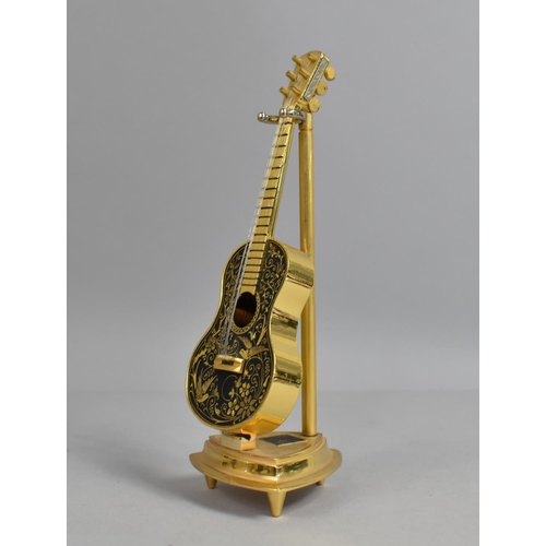 15 - A Modern Novelty Desk top Model of a Spanish Guitar, 18cms High