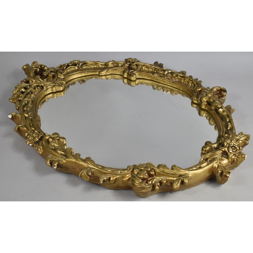 298 - A Gilt Cast Plaster Ornate Wall Mirror, 50x68cm