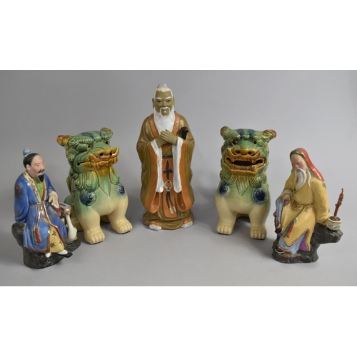 323 - A Pair of Sancia Glazed Temple Lions Together with a Chinese Mud Man and Two Chinese Porcelain Figur... 