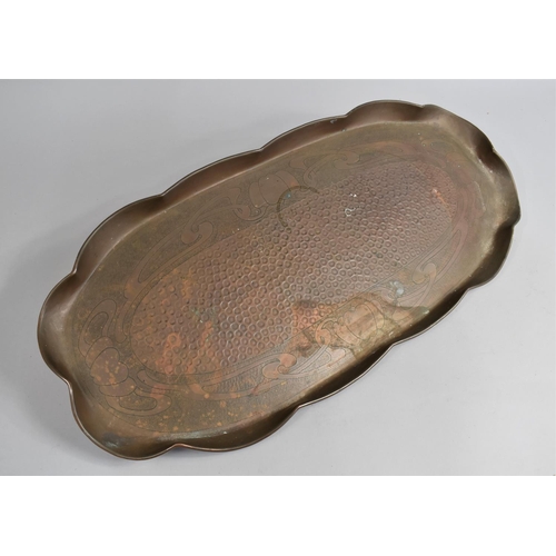 507 - A Hand Beaten Arts and Crafts Copper Tray, 58cm wide