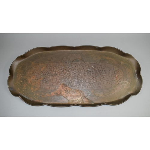 507 - A Hand Beaten Arts and Crafts Copper Tray, 58cm wide