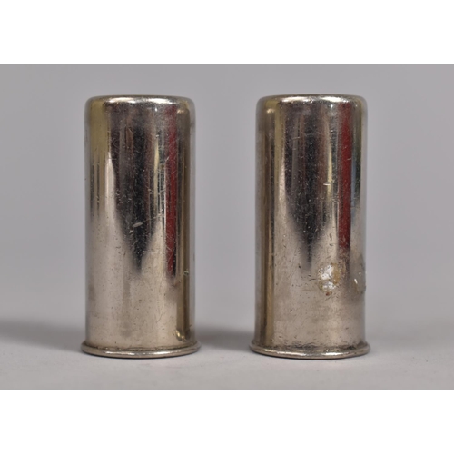 102 - A Pair of Silver Plated Twelve Bore Shotgun Cartridge Bases