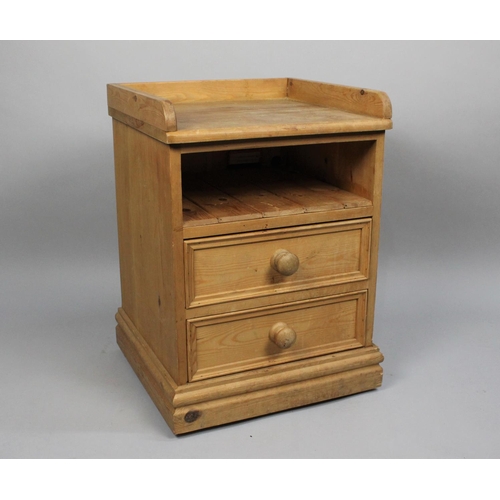 118 - A Mid 20th Century Pine Galleried Two Drawer Bedside Chest, 46cms Wide