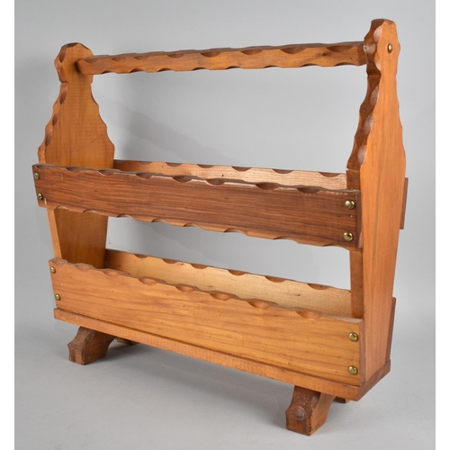 137 - A Mid 20th Century Wooden Magazine Rack, 48cms wide