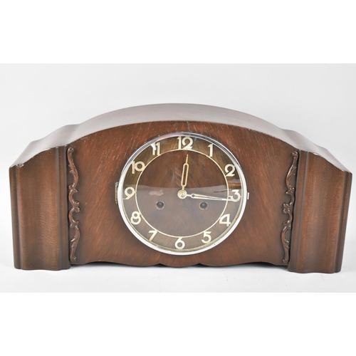 142 - A Mid 20th Century Mantel Clock, 44cms Wide